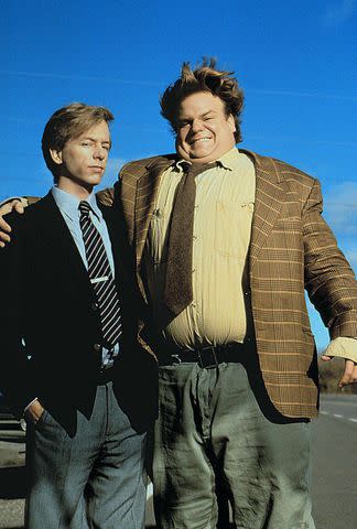 <p>Cinematic/Alamy</p> David Spade and Chris Farley in 1995's Tommy Boy