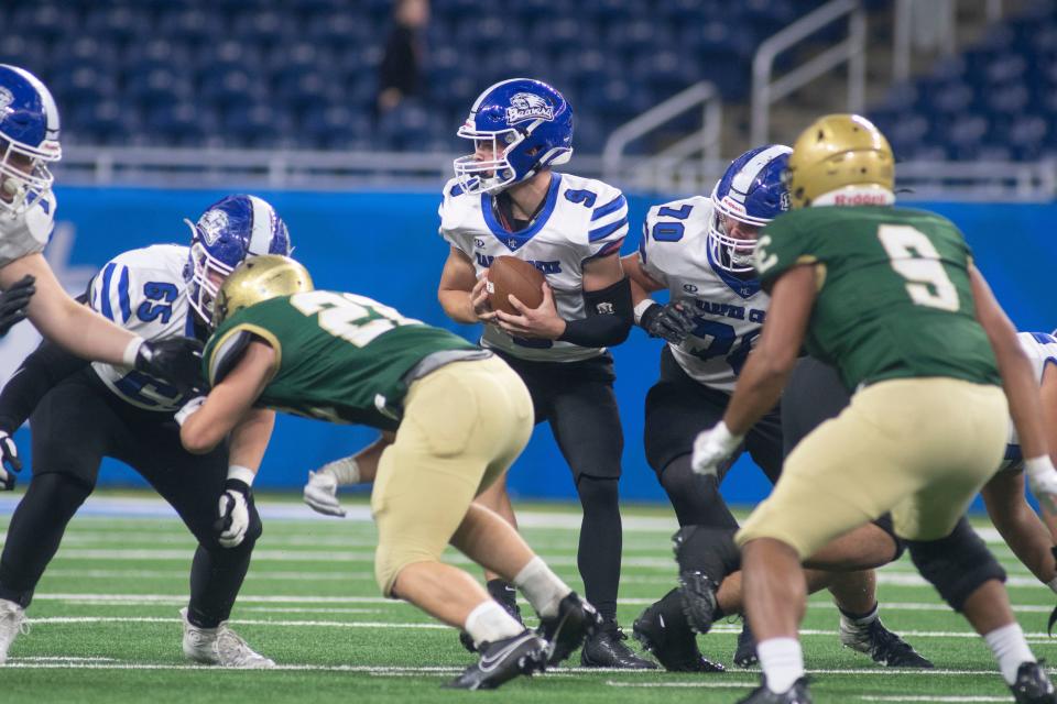 Harper Creek junior Chase Nichols receives the ball during a game against Lumen Christi at Ford Field in Detroit on Saturday, Oct. 21, 2023.