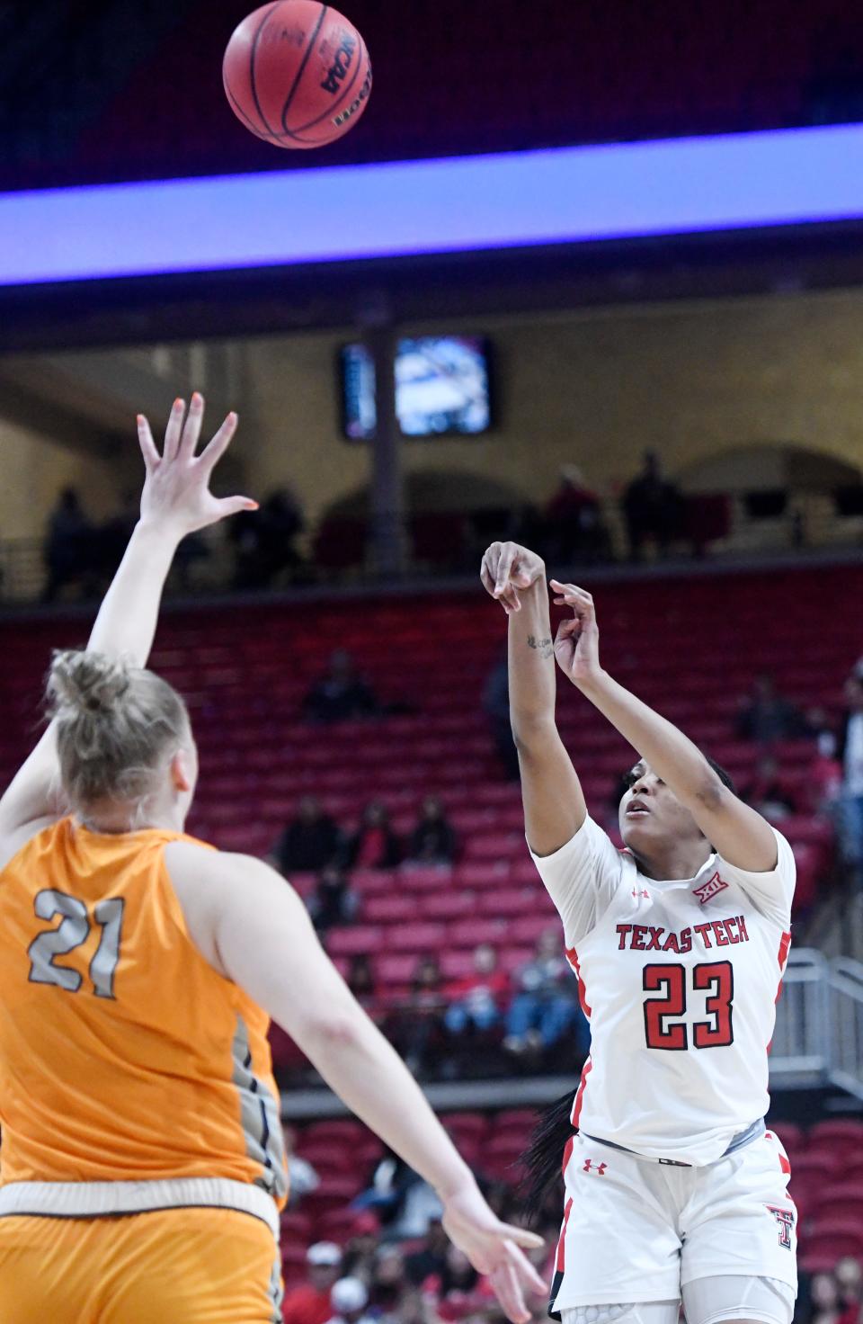 Texas Tech's guard Bre'Amber Scott (23) shoots the ball against UTEP in the Women's National Invitation Tournament first round game, Thursday, March 16, 2023, at United Supermarkets Arena. 