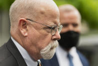 Special counsel John Durham, the prosecutor appointed to investigate potential government wrongdoing in the early days of the Trump-Russia probe, leaves federal court in Washington, Monday, May 16, 2022. A jury was picked Monday in the trial of a lawyer for the Hillary Clinton presidential campaign who is accused of lying to the FBI as it investigated potential ties between Donald Trump and Russia in 2016. (AP Photo/Manuel Balce Ceneta)
