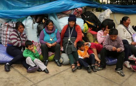 Residents of the town Cerro de Pasco in the Peruvian Andes chained themselves outside of the health ministry to protest for what they describe as rampant pollution from a sprawling polymetallic mine operated by Peruvian mining company Volcan, in Lima, Peru June 22, 2017. REUTERS/Mariana Bazo