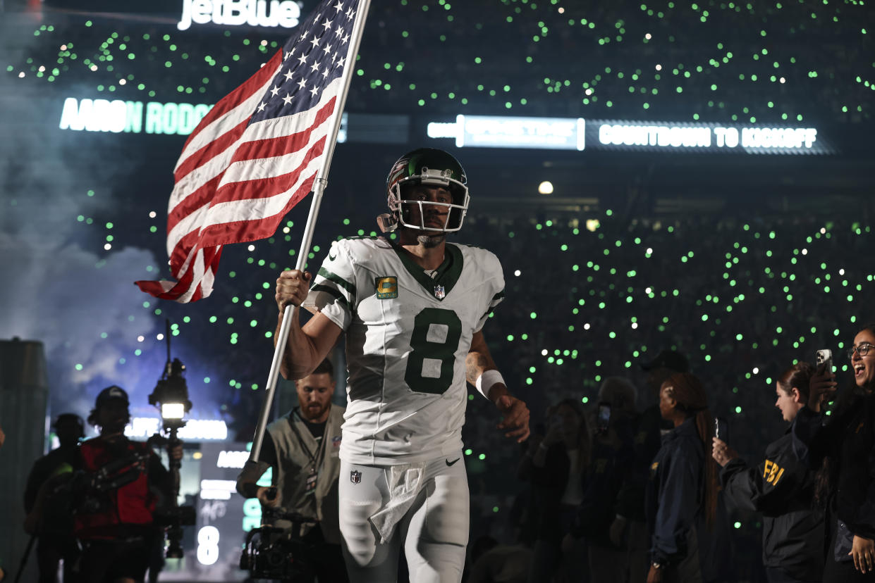 We all looked forward to Aaron Rodgers' debut with the Jets. Unfortunately, it lasted all of four snaps, which made us feel a different emotion. (Photo by Michael Owens/Getty Images)