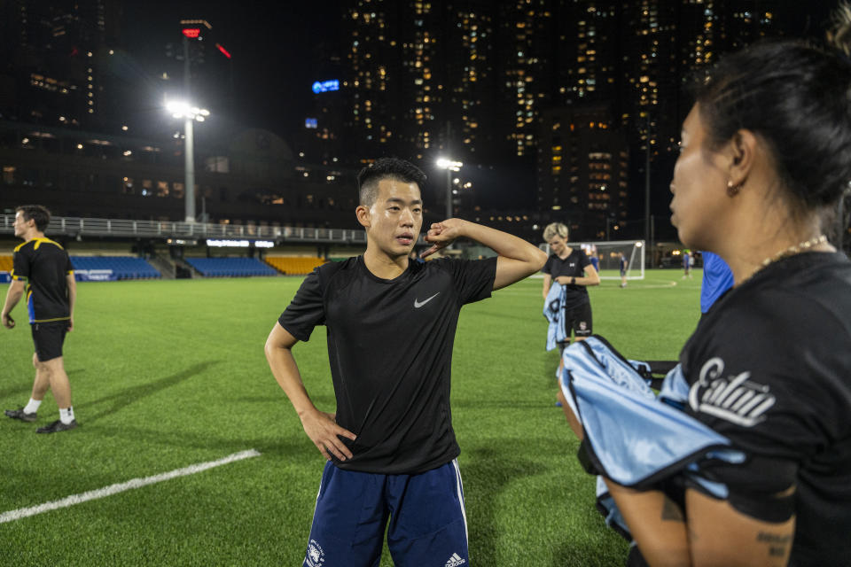 Emery Fung, center, volunteer of Gay Games attends a training session in Happy Valley ahead of the Gay Games in Hong Kong, Tuesday, Oct. 31, 2023. Set to launch on Friday, Nov. 3, 2023, the first Gay Games in Asia are fostering hopes for wider LGBTQ+ inclusion in the Asian financial hub. (AP Photo/Chan Long Hei)