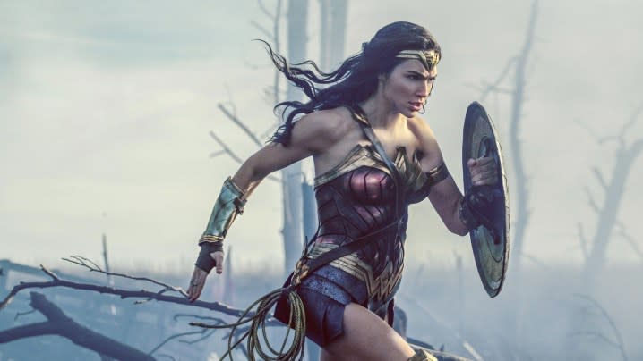 Wonder Woman runs on a battlefield in Wonder Woman.