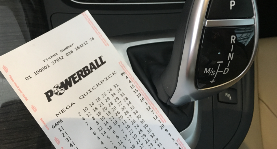 A Powerball ticket in a car.