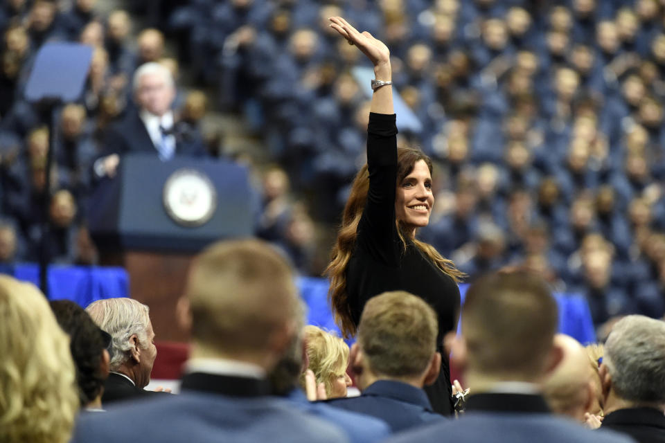 South Carolina state Rep. Nancy Mace, the first woman to graduate from The Citadel, smiles after being recognized by Vice President Mike Pence during a speech at the The Citadel, Thursday, Feb. 13, 2020, in Charleston, S.C. (AP Photo/Meg Kinnard
