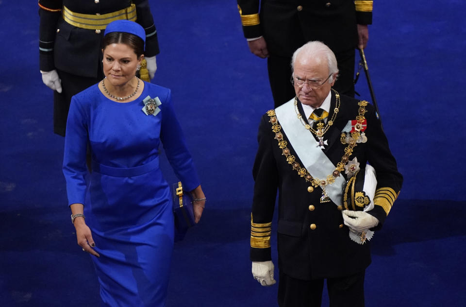 FILE - Sweden's King Carl XVI Gustav and Crown Princess Victoria attend the coronation of Britain's King Charles III and Queen Camilla at Westminster Abbey, London, Saturday May 6, 2023. (Andrew Matthews/Pool via AP, File)