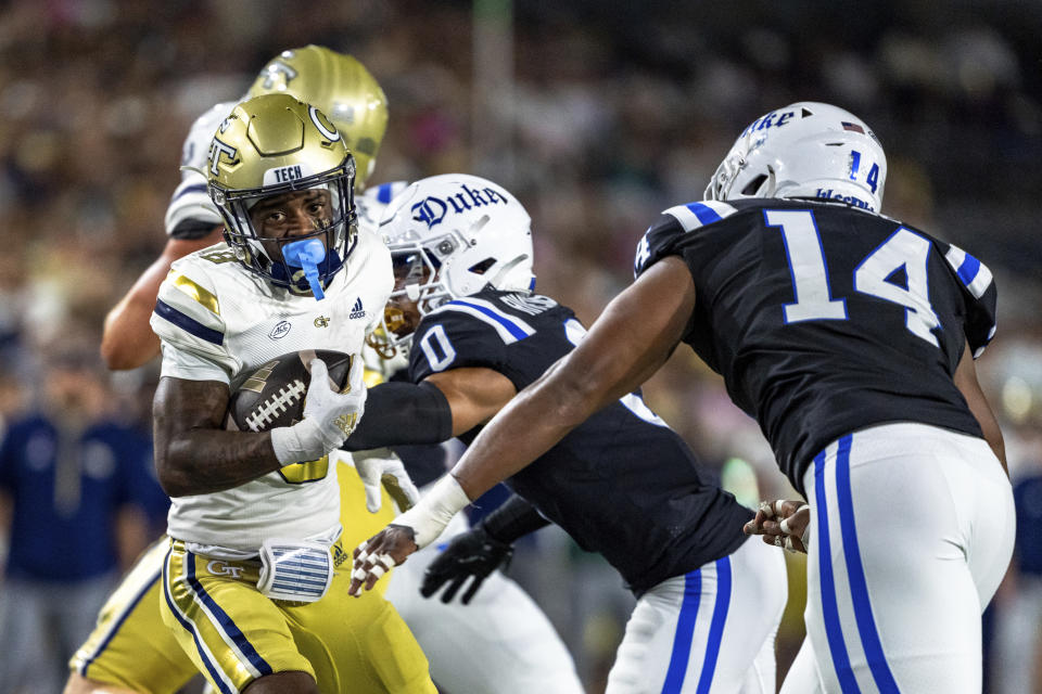 Georgia Tech wide receiver Malik Rutherford (8) breaks a tackle in the first quarter of a football game against the Duke, during an NCAA college football game, Saturday, Oct. 5, 2024, in Atlanta. (AP Photo/Jason Allen)