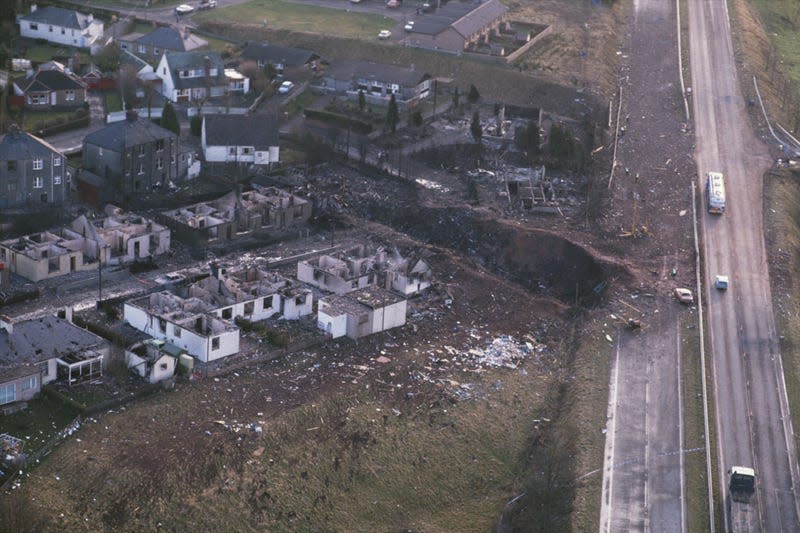 Some of the destruction caused by Pan Am Flight 103 after it crashed onto the town of Lockerbie in Scotland, on December 21, 1988.