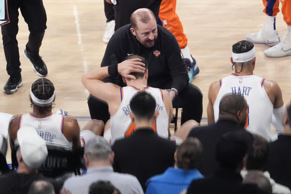 New York Knicks head coach Tom Thibodeau, center, gives his team instruction during a timeout in the first half in Game 1 of an NBA basketball first-round playoff series against the Philadelphia 76ers, Saturday, April 20, 2024, at Madison Square Garden in New York. (AP Photo/Mary Altaffer)