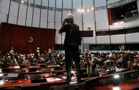 Protesters are seen inside a chamber after they broke into the Legislative Council building during the anniversary of Hong Kong's handover to China in Hong Kong