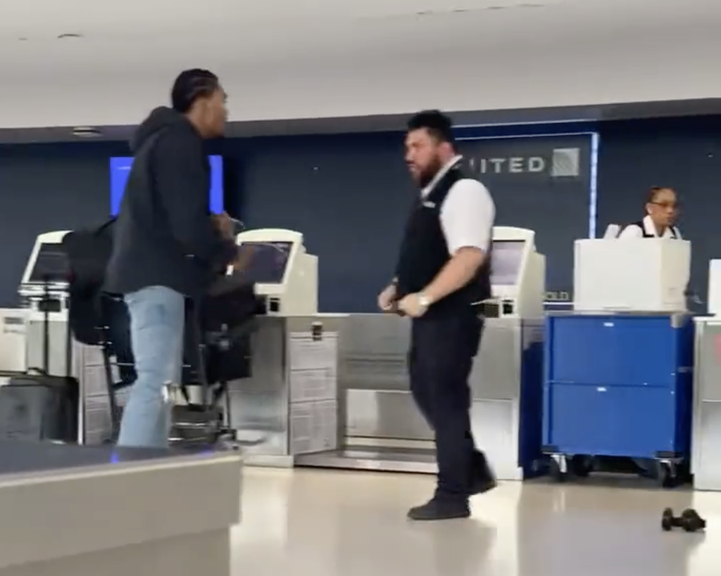 A viral video shows a United Airlines employee in a fistfight with former NFL player Brendan Langley (Twitter)