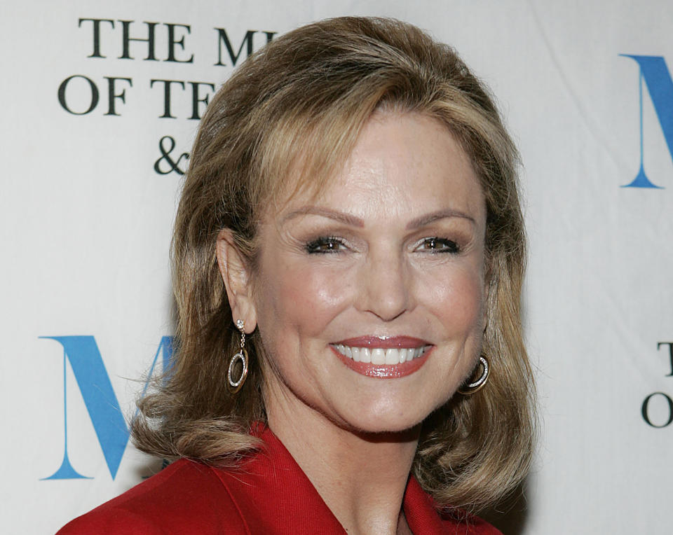 FILE - In this Dec. 1, 2005, file photo, Phyllis George arrives at the Museum of Television and Radio "She Made It" launch party in New York. George, the former Miss America who became a female sportscasting pioneer on CBS's “The NFL Today” and served as the first lady of Kentucky, has died. She was 70. A family spokeswoman said George died Thursday, May 14, 2020, at a Lexington hospital after a long fight with a blood disorder. (AP Photo/Stephen Chernin, File)