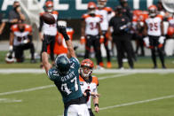 Cincinnati Bengals' Joe Burrow, right, cannot get a pass past Philadelphia Eagles' Nathan Gerry during the first half of an NFL football game, Sunday, Sept. 27, 2020, in Philadelphia. (AP Photo/Laurence Kesterson)