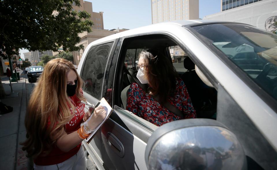Officials with the Paso del Norte Foundation kicked off El Paso Giving Day by handing out swag bags and piñatas Oct. 7, 2020, in Downtown El Paso.