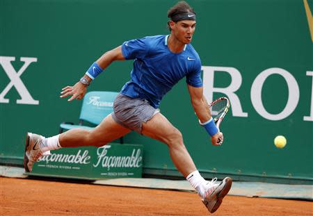 Rafael Nadal of Spain returns the ball to Teymuraz Gabashvili of Russia during the Monte Carlo Masters in Monaco April 16, 2014. REUTERS/Eric Gaillard