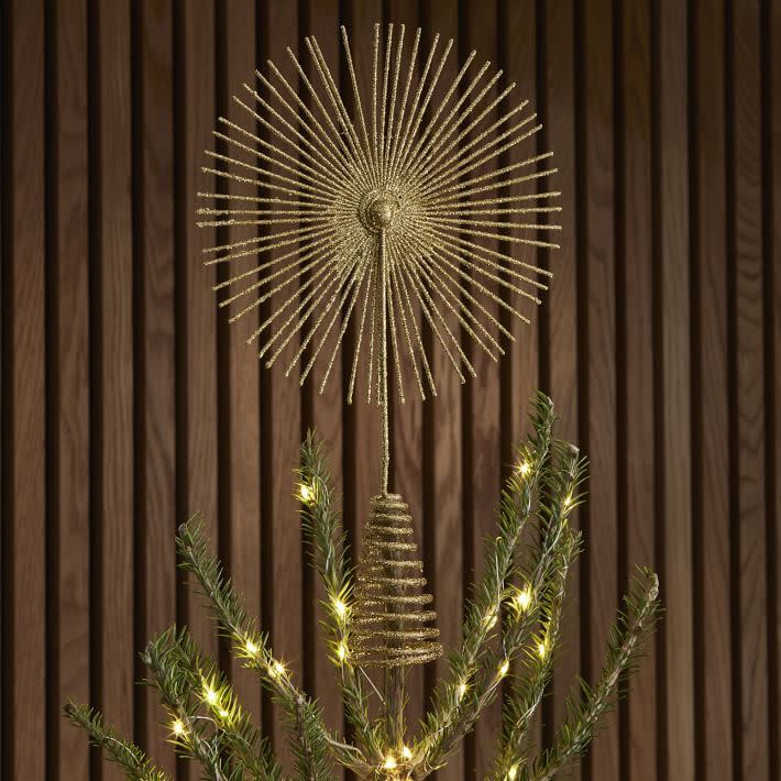 <p><a href="https://go.redirectingat.com?id=74968X1596630&url=https%3A%2F%2Fwww.westelm.com%2Fproducts%2Fglitter-starburst-tree-topper-d8968&sref=https%3A%2F%2Fwww.housebeautiful.com%2Fentertaining%2Fholidays-celebrations%2Fg45735039%2Fchristmas-tree-topper-ideas%2F" rel="nofollow noopener" target="_blank" data-ylk="slk:Shop Now;elm:context_link;itc:0;sec:content-canvas" class="link rapid-noclick-resp">Shop Now</a></p><p>Glitter Starburst Tree Topper</p><p>westelm.com</p><p>$20.00</p>