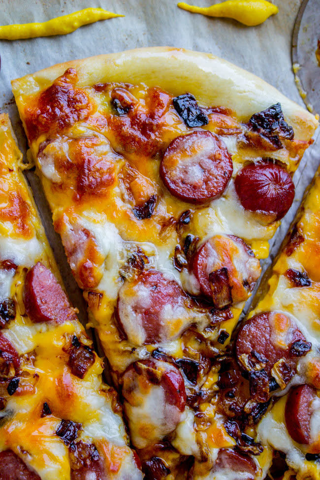 <strong>Get the <a href="http://thefoodcharlatan.com/2017/06/30/leftover-hot-dog-pizza-recipe/" target="_blank">Leftover Hot Dog Pizza with Caramelized Onions recipe</a>&nbsp;from&nbsp;The Food Charlatan</strong>