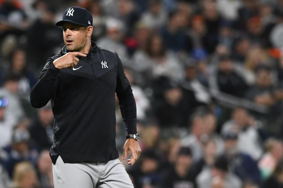 Apr 15, 2022; Baltimore, Maryland, USA;  New York Yankees manager Aaron Boone  jogs to the pitcher's mound during the sixth inning against the Baltimore Orioles at Oriole Park at Camden Yards.