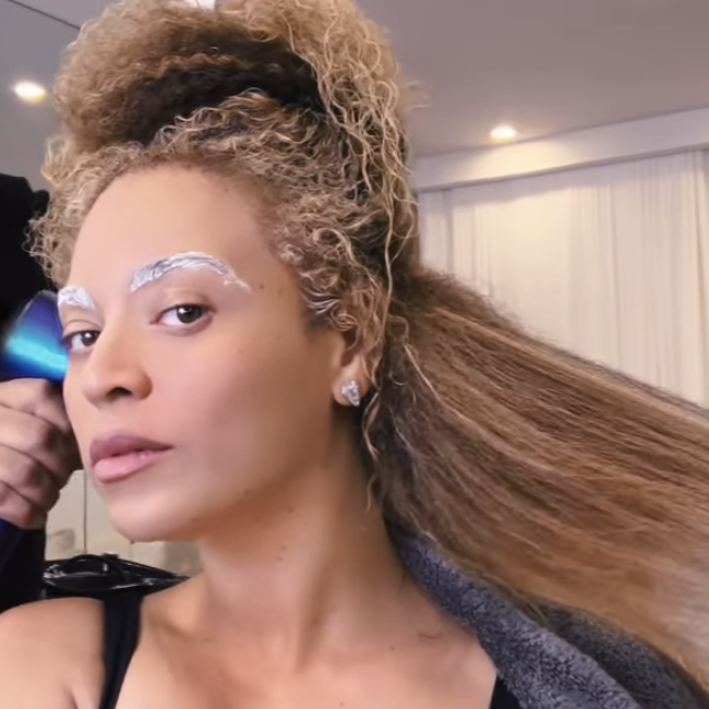 Closeup of Beyoncé getting a hair treatment