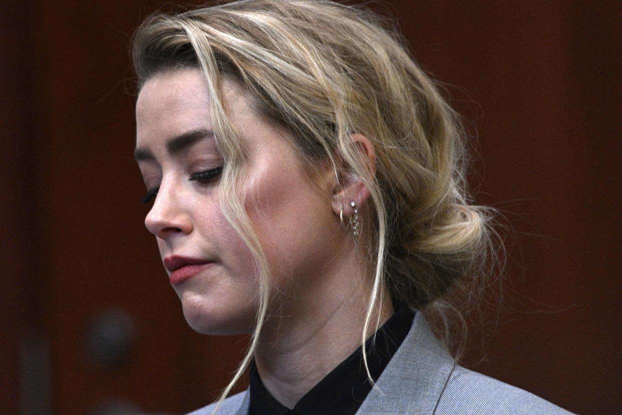 Amber Heard inside the courtroom during $50 million defamation trial involving her ex Johnny Depp at the Fairfax County Circuit Court, April 12, 2022, in Fairfax, Virginia.