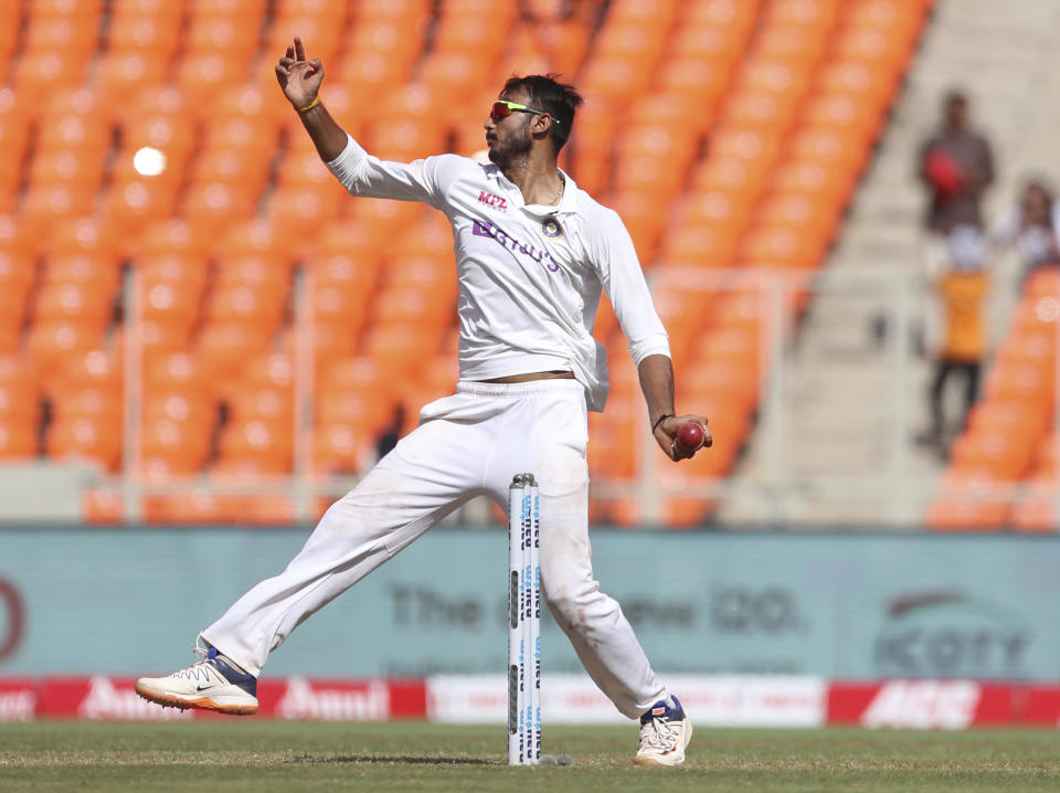 India's Axar Patel bowls during the third day of fourth cricket test match between India and England at Narendra Modi Stadium in Ahmedabad, India, Saturday, March 6, 2021. (AP Photo/Aijaz Rahi)