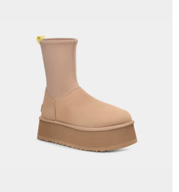 <p><a href="https://go.redirectingat.com?id=74968X1596630&url=https%3A%2F%2Fwww.ugg.com%2Fca%2Fwomen-sale-boots%2Fclassic-dipper%2F1144031.html&sref=https%3A%2F%2F" rel="nofollow noopener" target="_blank" data-ylk="slk:Shop Now;elm:context_link;itc:0;sec:content-canvas" class="link ">Shop Now</a></p><p>Classic Dipper</p><p>ugg.com</p><p>$149.99</p>