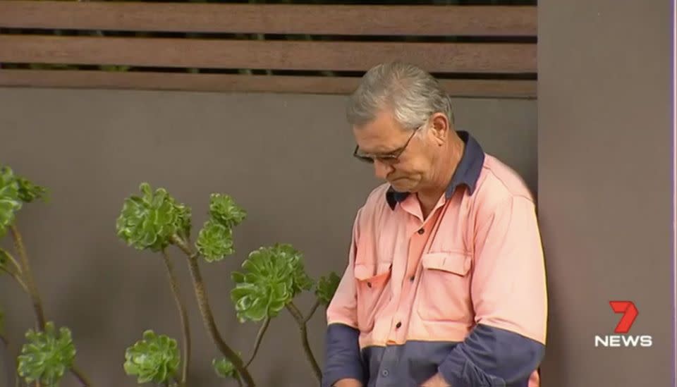 The distraught truck driver after the accident. Source: 7 News