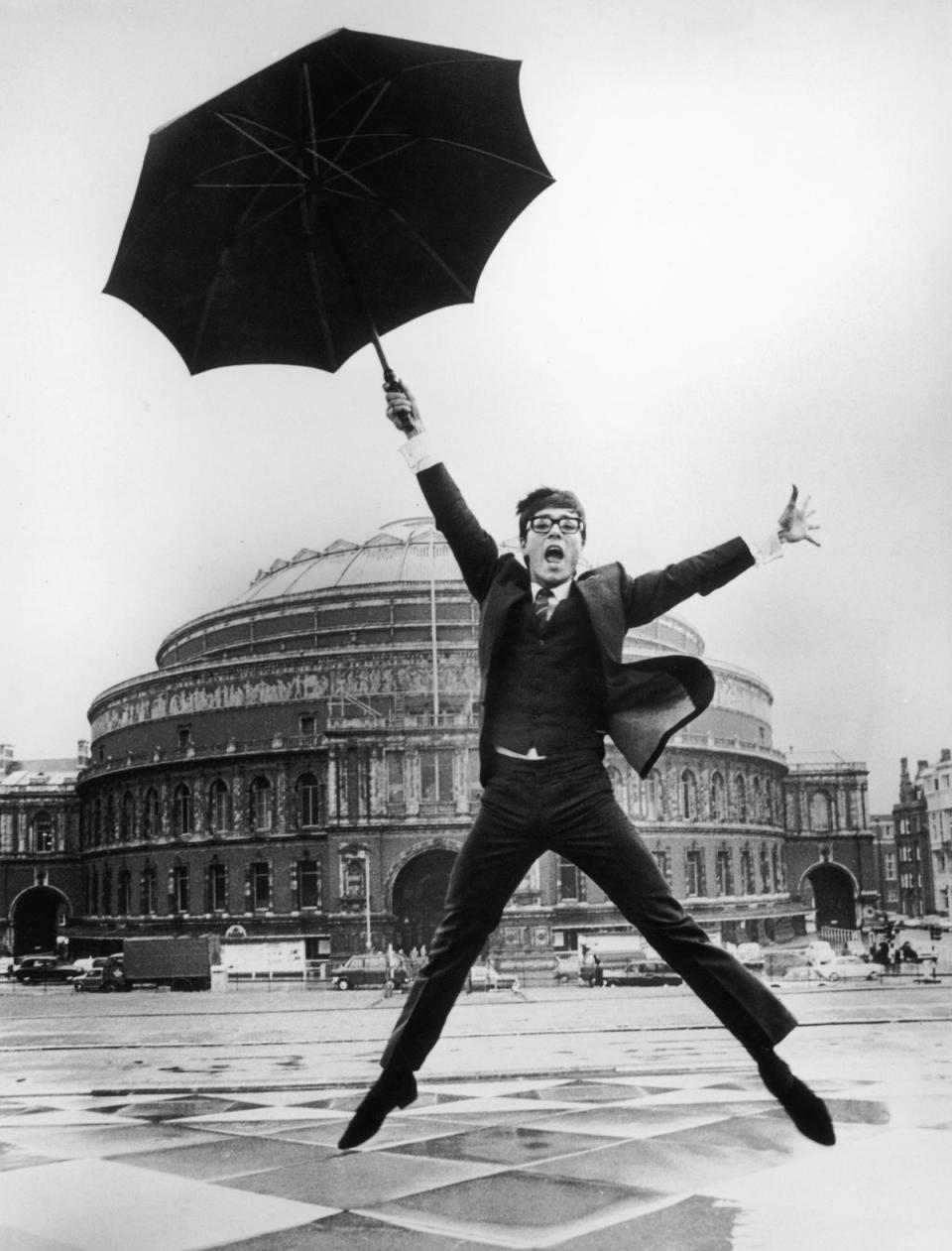 Cliff Richard in a display of enthusiasm outside the Royal Albert Hall, London ahead of the 1967 Eurovision song contest (Getty Images)