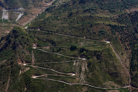 A mountain road is seen in an ethnic Lisu village in Luzhang township of Nujiang Lisu Autonomous Prefecture in Yunnan province, China, March 28, 2018. REUTERS/Aly Song