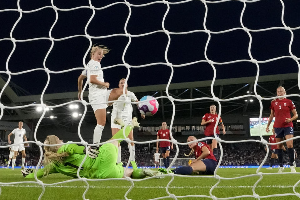 FILE - England's Beth Mead, center left, scores her third goal, England's 8th, during the Women Euro 2022 group A soccer match between England and Norway at Brighton & Hove Community Stadium in Brighton, England, Monday, July 11, 2022. England won 8-0. (AP Photo/Alessandra Tarantino, File)