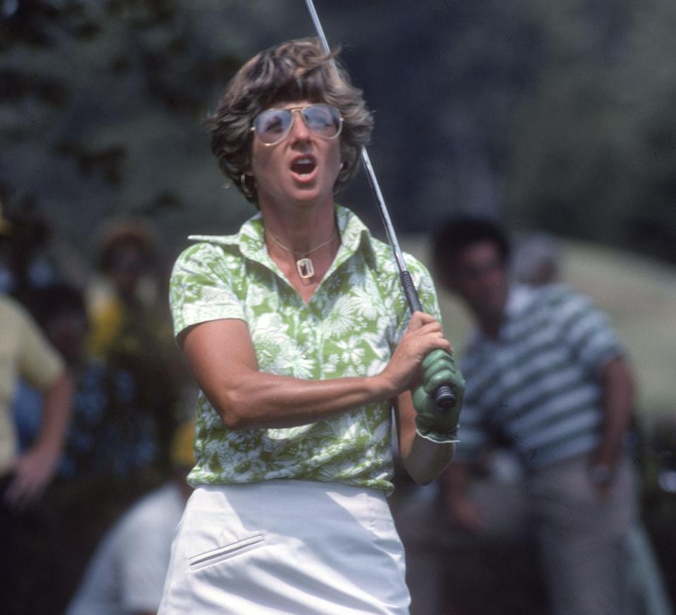 Women’s golfer Sandra Palmer swings and watches the flight of her ball during tournament play circa 1977. Palmer was on the LPGA Tour from 1964-1997. (Photo by Focus on Sport/Getty Images)