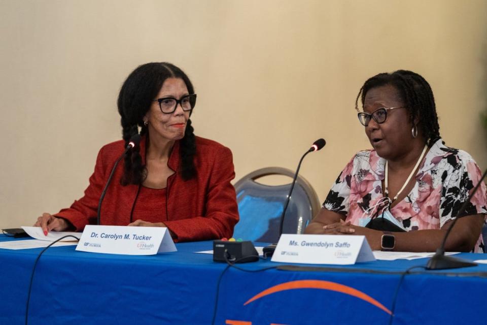 Dr. Carolyn Tucker, left, UF Florida Blue Endowed Chair in Health Disparities Research, will lead UF researchers and community members working to address mental health service disparities in East Gainesville. She is pictured here with Gwendolyn Saffo on a panel at the 2022 UF Health Power Over Cancer event.