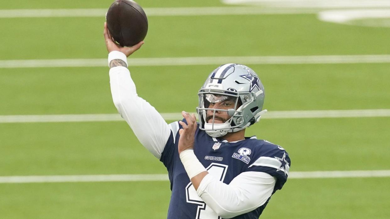 Mandatory Credit: Photo by Ashley Landis/AP/Shutterstock (10775837bh)Dallas Cowboys quarterback Dak Prescott (4) warms up before an NFL football game against the Los Angeles Rams, in Inglewood, CalifCowboys Rams Football, Inglewood, United States - 13 Sep 2020.