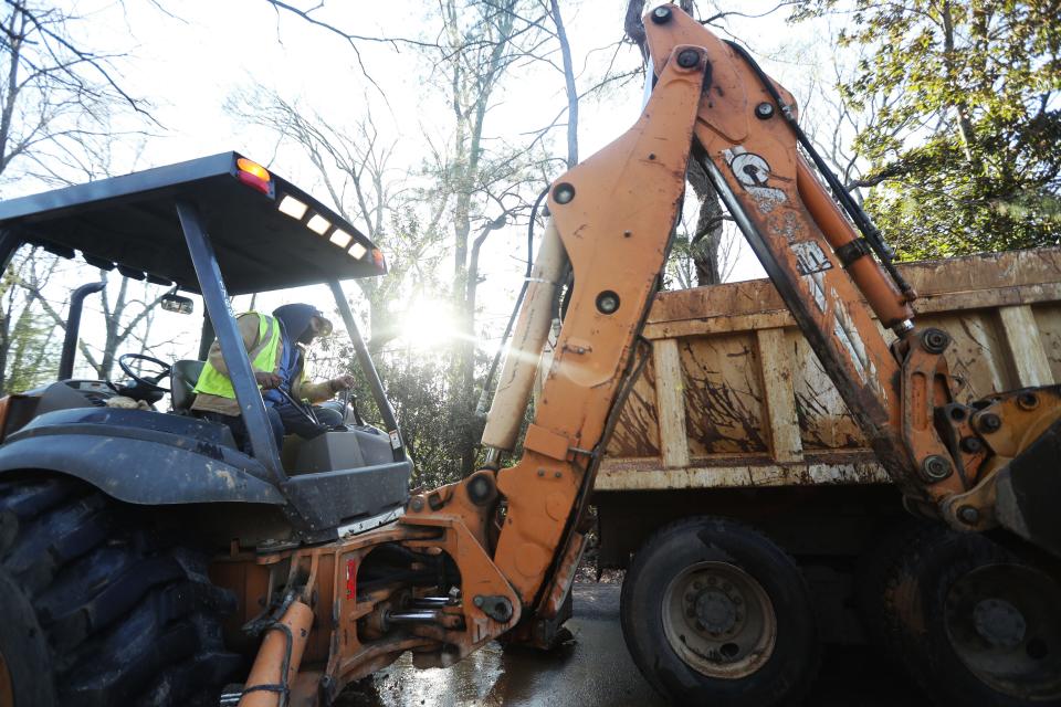 MLGW works to fix water issues near a residence in Raleigh on Dec. 27, 2022, in Memphis.