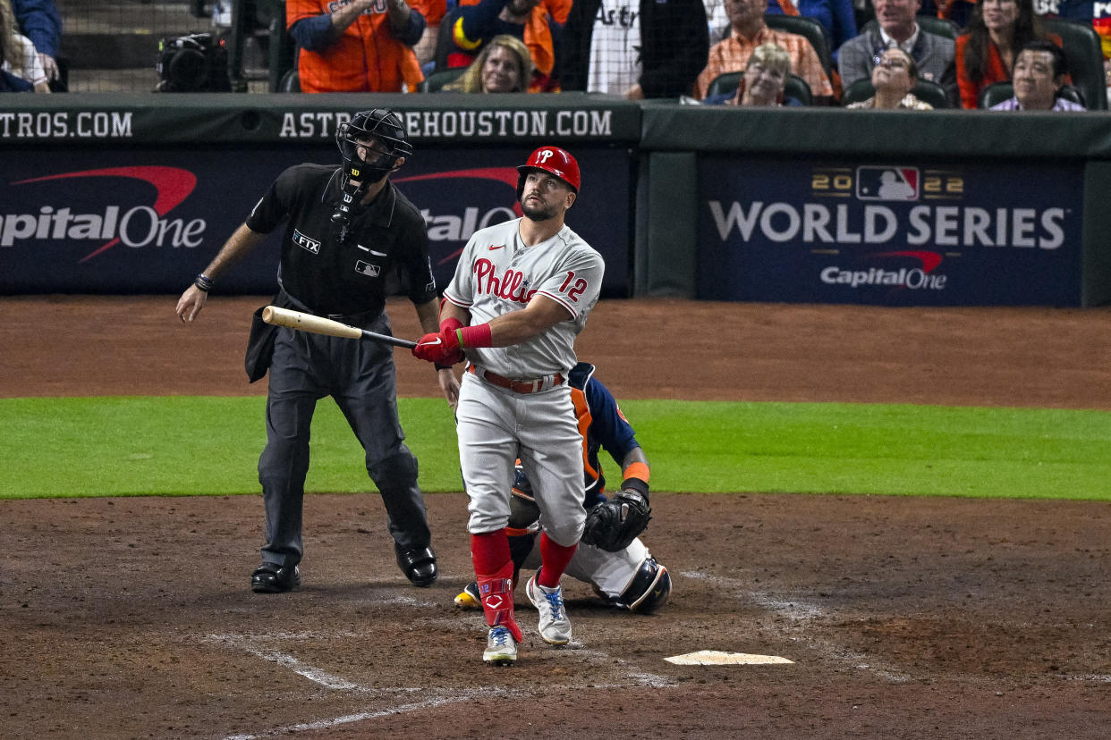 Oct 29, 2022; Houston, Texas, USA; Philadelphia Phillies left fielder Kyle Schwarber (12) and home plate umpire Pat Hoberg watch as a ball hit by Schwarber goes foul during the eighth inning during game two of the 2022 World Series at Minute Maid Park. Mandatory Credit: Jerome Miron-USA TODAY Sports