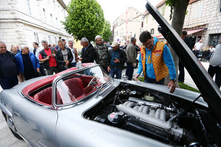 A man shows oldtimer Mercedes car 300SL in Imotski, Croatia, May 19, 2019. REUTERS/Antonio Bronic