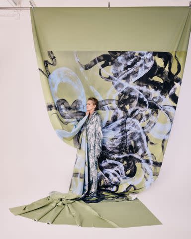 <p>Eric Michael Roy</p> Sharon Stone shot in front of her artwork in Los Angeles in January. Lapointe jacket and pants, Givenchy top, Agmes earrings, and Jimmy Choo x Jean Paul Gaultier heels.