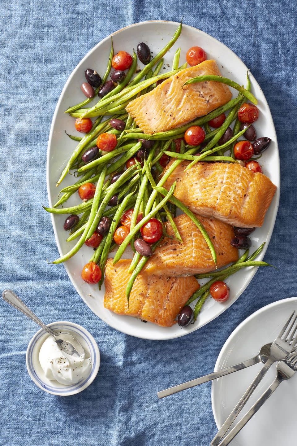 <p>Prepare this quick and easy <strong>roasted salmon</strong> ahead of time and it makes for a delicious and<strong> healthy protein-packed desk lunch</strong> (it can be great for dinner, too).</p><p><a href="https://www.goodhousekeeping.com/food-recipes/easy/a22749664/roasted-salmon-with-green-beans-and-tomatoes-recipe/" rel="nofollow noopener" target="_blank" data-ylk="slk:Get the recipe for Roasted Salmon with Green Beans and Tomatoes »;elm:context_link;itc:0;sec:content-canvas" class="link "><em>Get the recipe for Roasted Salmon with Green Beans and Tomatoes »</em></a></p>