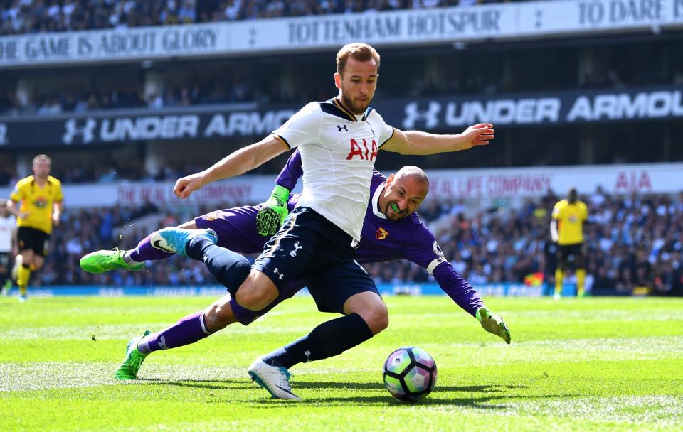 <p>Harry Kane takes the ball past Watford keeper Heurelho Gomes</p>