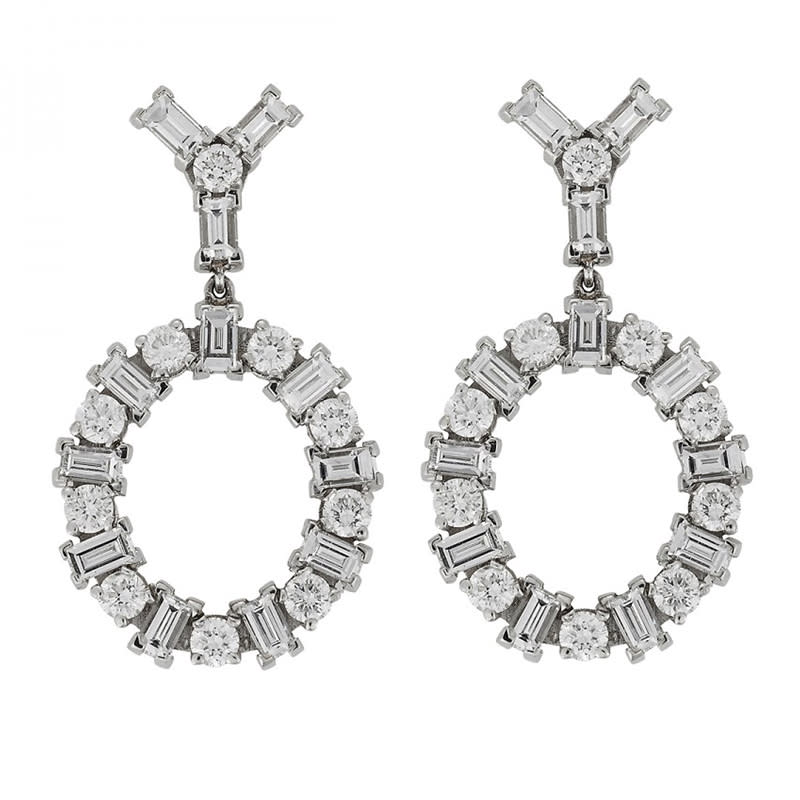 <a rel="nofollow noopener" href="http://www.ileanamakri.com/earrings/gold-evil-eye-earrings-2403" target="_blank" data-ylk="slk:18K White Gold Earrings With Round and Baguette White Diamonds, Ileana Makri, $12355;elm:context_link;itc:0;sec:content-canvas" class="link ">18K White Gold Earrings With Round and Baguette White Diamonds, Ileana Makri, $12355</a>