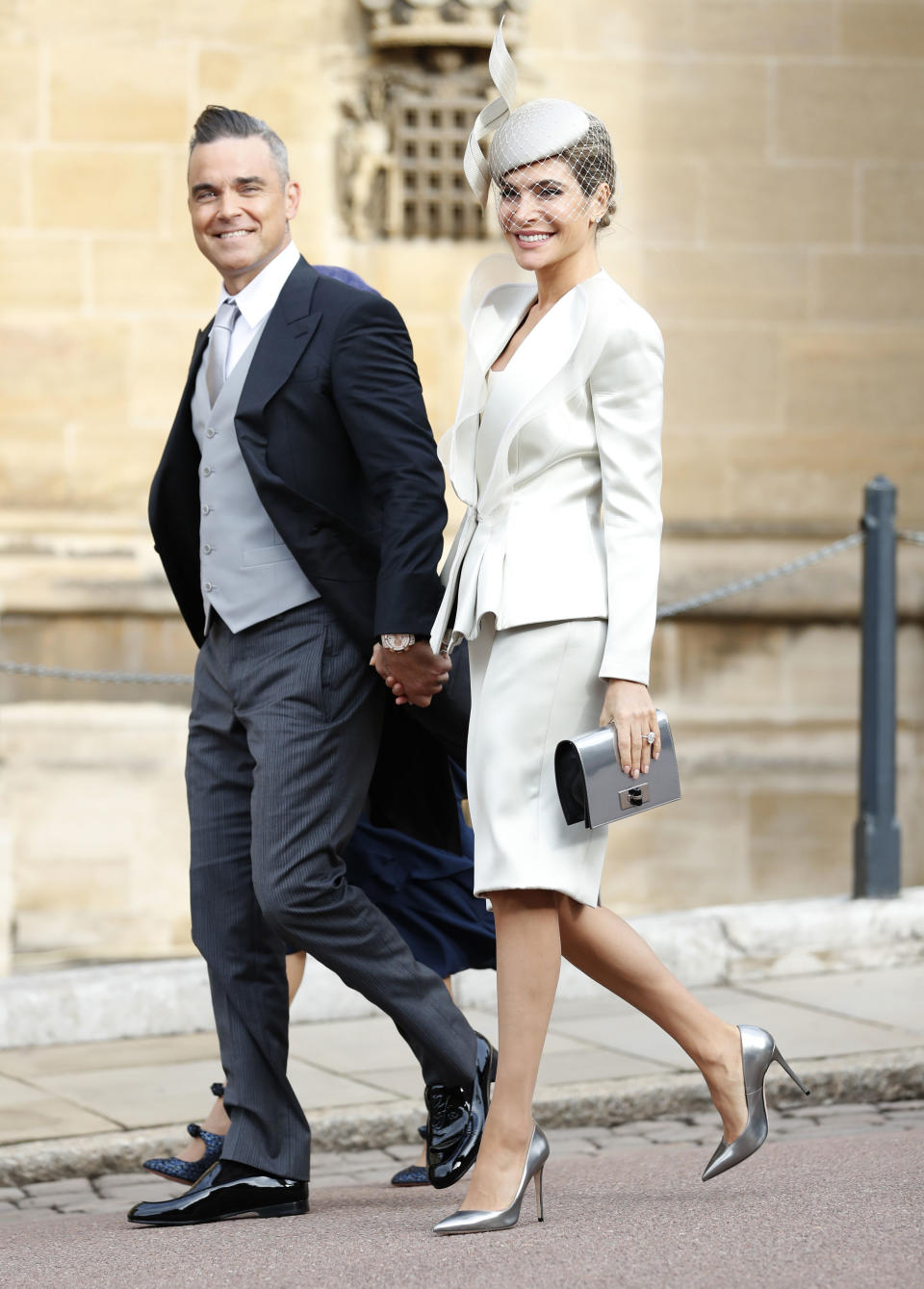 Robbie Williams and his wife Ayda Field, arrive for the wedding of Princess Eugenie and Jack Brooksbank at St George's Chapel, Windsor Castle.