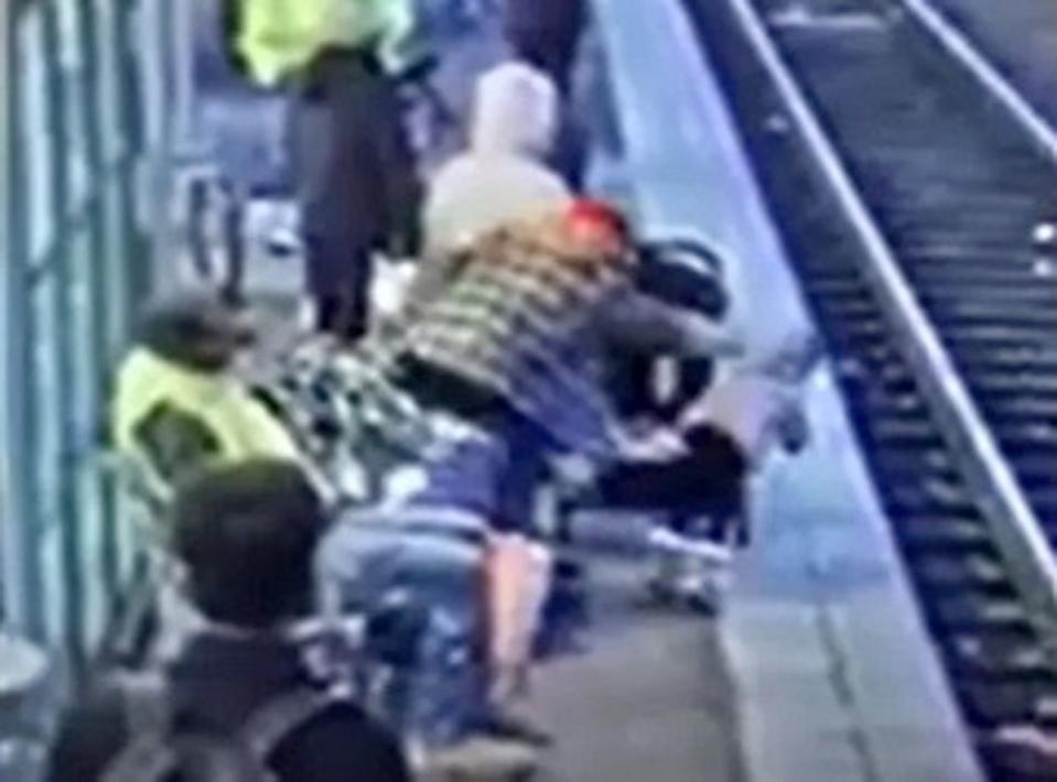Footage captures moment a woman shoved a small child onto train tracks (Multnomah County District Attorney’s Office)