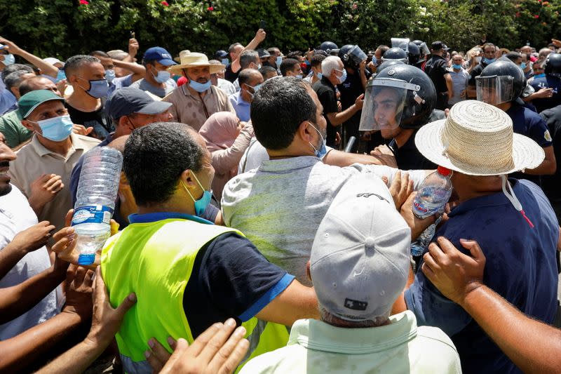 Tunisians gather after president ousts government, in Tunis