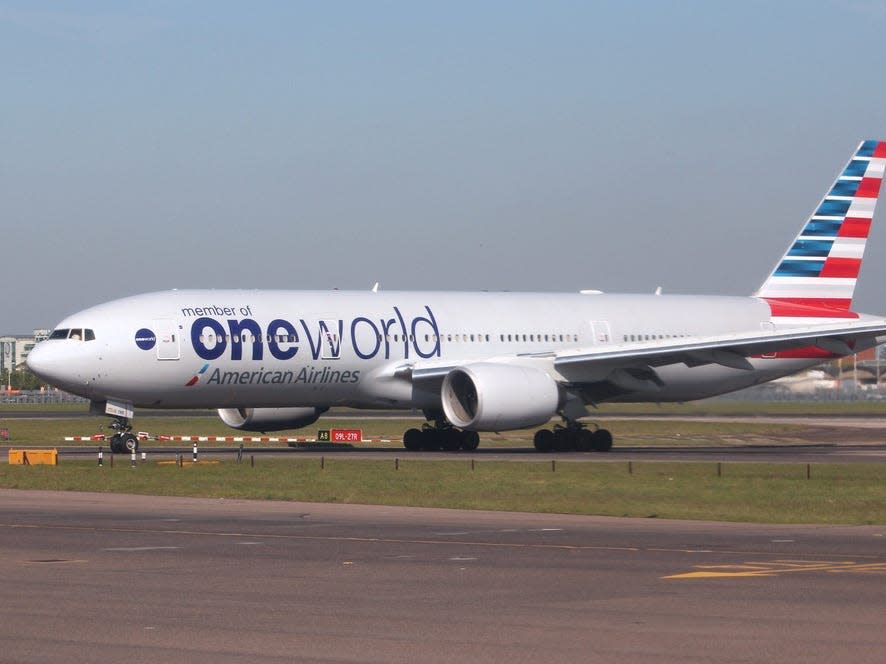 American Airlines oneworld livery.