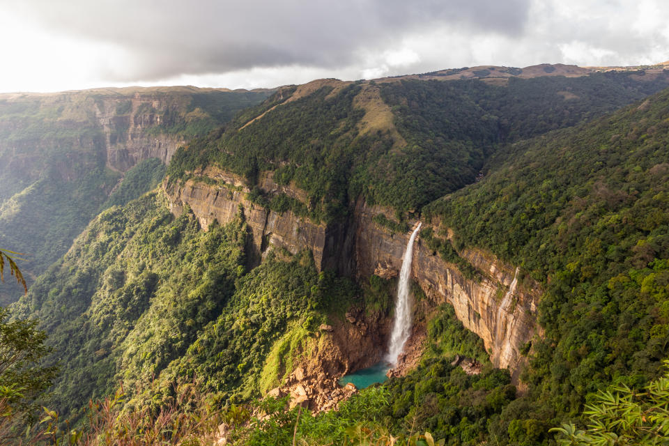 The Nohkalikai waterfalls in the lush green forested hills in the Khasi hills in Meghalaya in Northeast India.