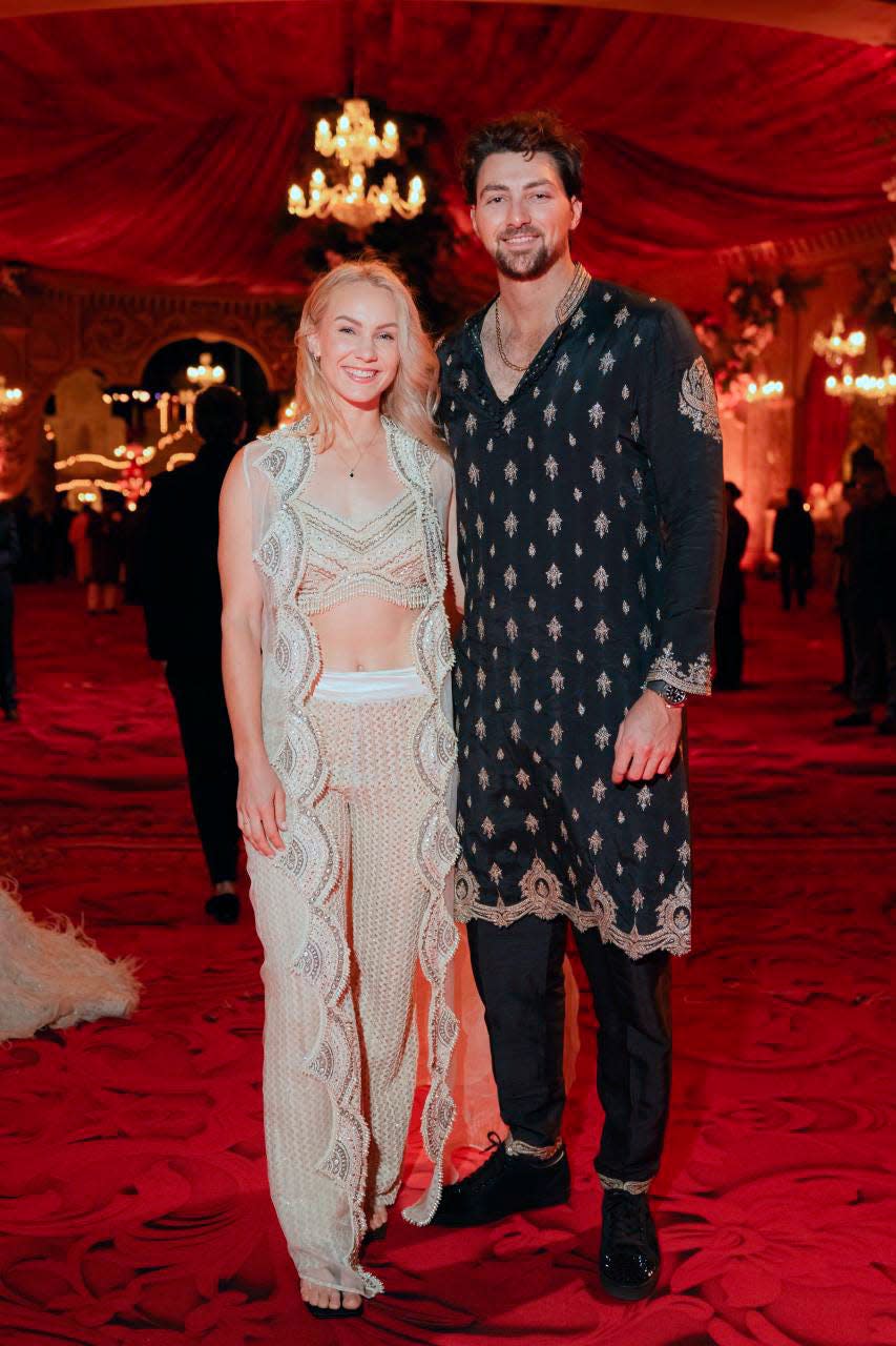 This photograph released by the Reliance group shows Australian cricketer Tim David and his wife Stephanie Kershaw posing for a photograph at a pre-wedding bash of Mukesh Ambani's son Anant Ambani in Jamnagar, India, Saturday, Mar. 02, 2024.