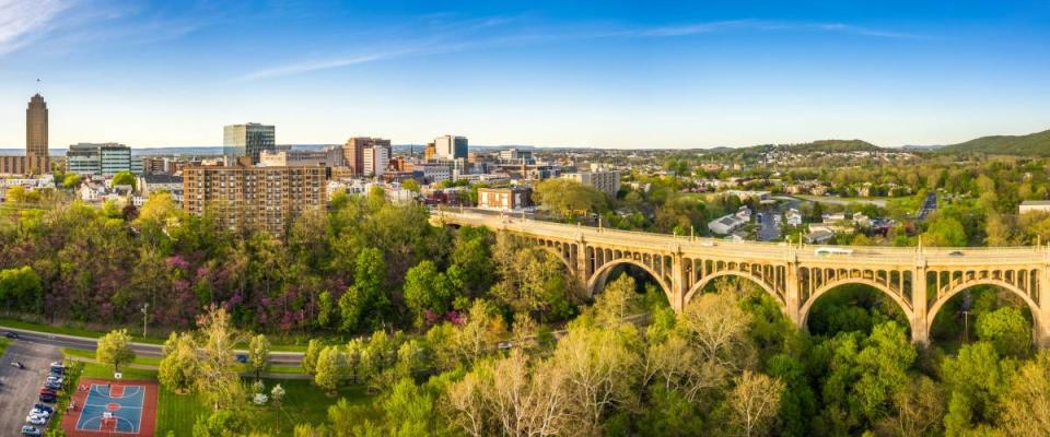 Aerial panorama of Allentown, Pennsylvania skyline and Albertus L. Meyers Bridge (aka Eighth Street Bridge) on late sunny afternoon . Allentown is Pennsylvania's third most populous city.