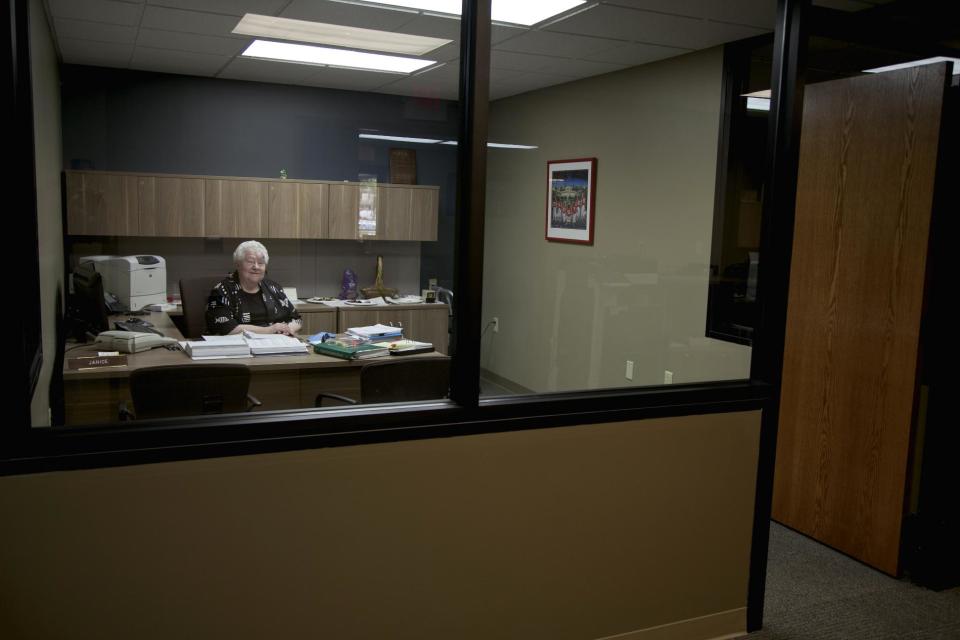 In this photo taken Aug. 1, 2012, Janice Durflinger poses for a photo at her workplace in Lincoln, Neb. Durflinger runs computer software programs for a bank. She says she still works at 76, "because I have to." Despite Social Security’s long-term problems, the massive retirement and disability program could be preserved for generations to come with modest but politically difficult changes to benefits, taxes or a combination of both. (AP Photo/Nati Harnik)