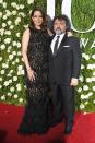 <p>The writer/actress, with her husband Jeff Richmond, wore an on-point dress by the New York designer. (Photo: Getty Images) </p>